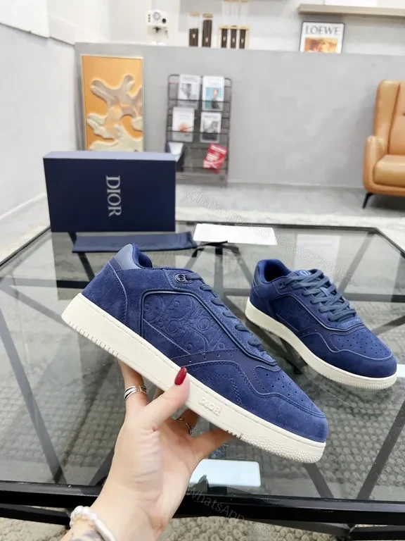 View 9 of Soft-Blend Navy Suede Sneakers with Monogram Detailing, Luxury Style