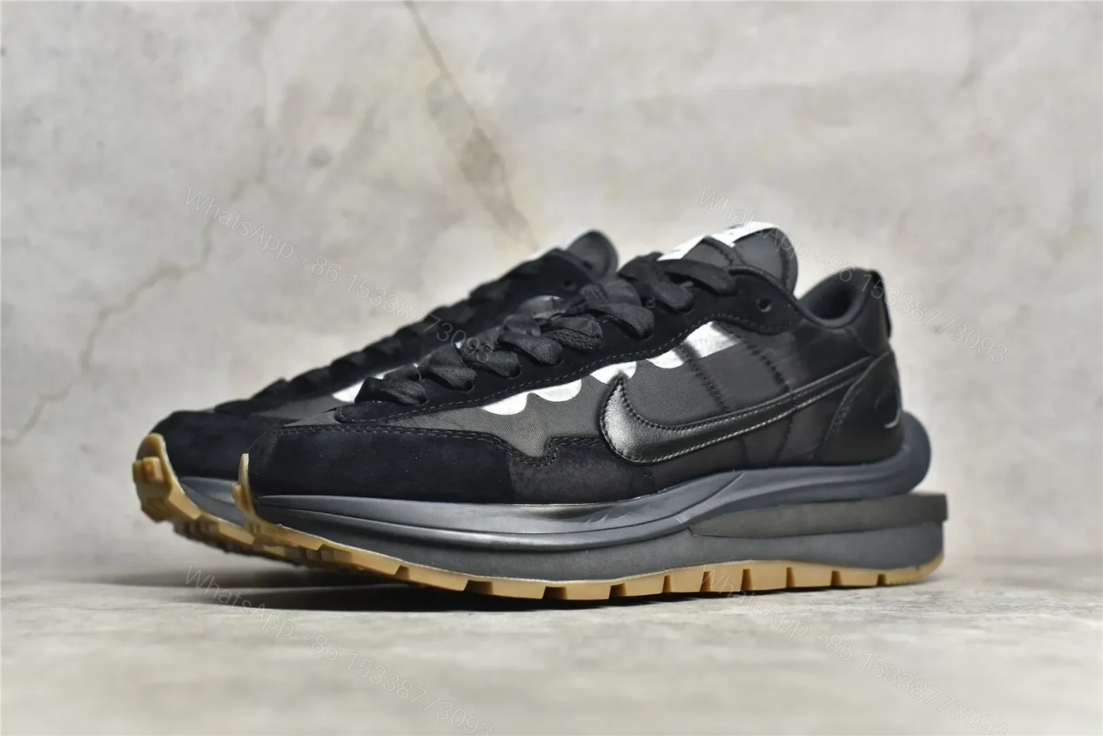 View 2 of Sacai × Nike VaporWaffle “Black and gum” Reps