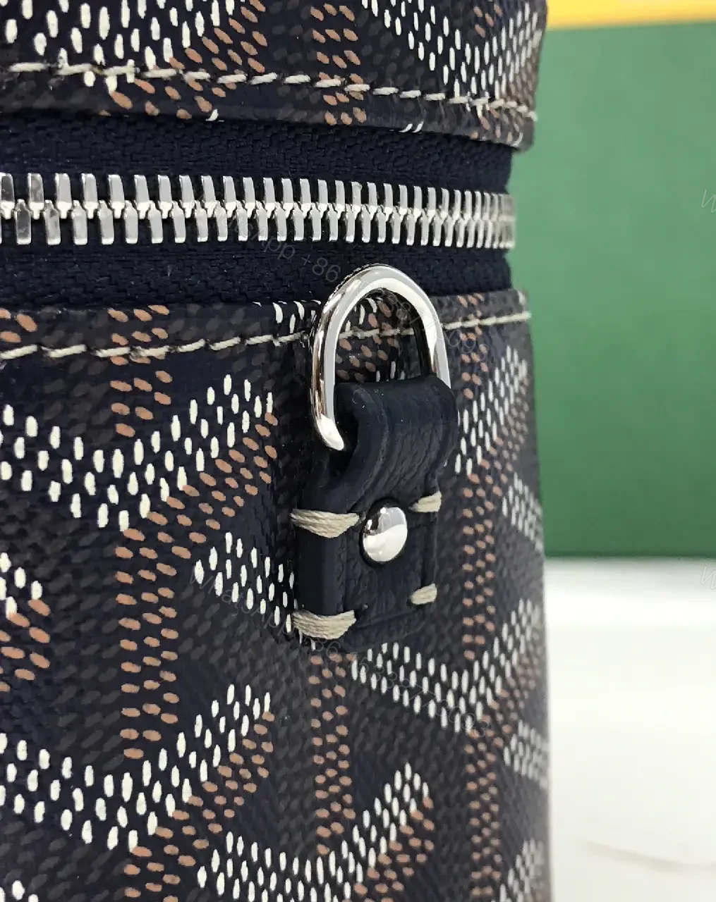 View 7 of Colorful coated-canvas pouch with distinctive pattern, compact design, durable, luxury vibe