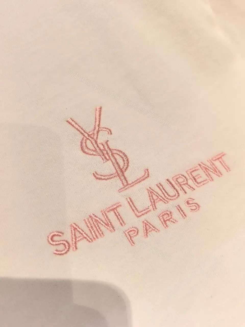 View 2 of Minimalist White Cotton Tee with Subtle Saint Laurent Detail
