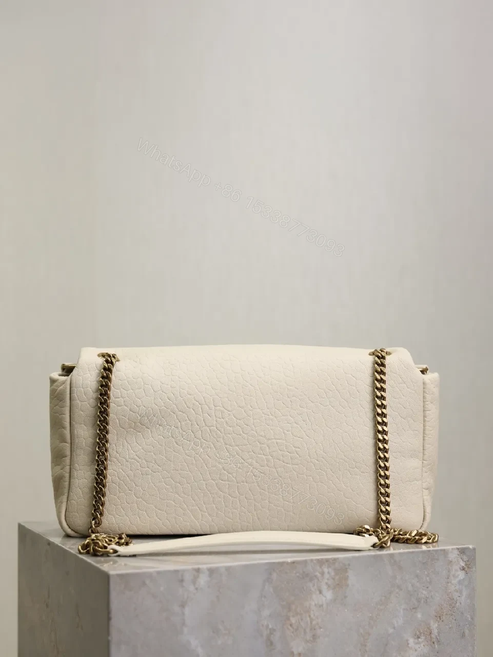 View 9 of Ivory Pebbled Leather Chic Handbag with Gold Hardware