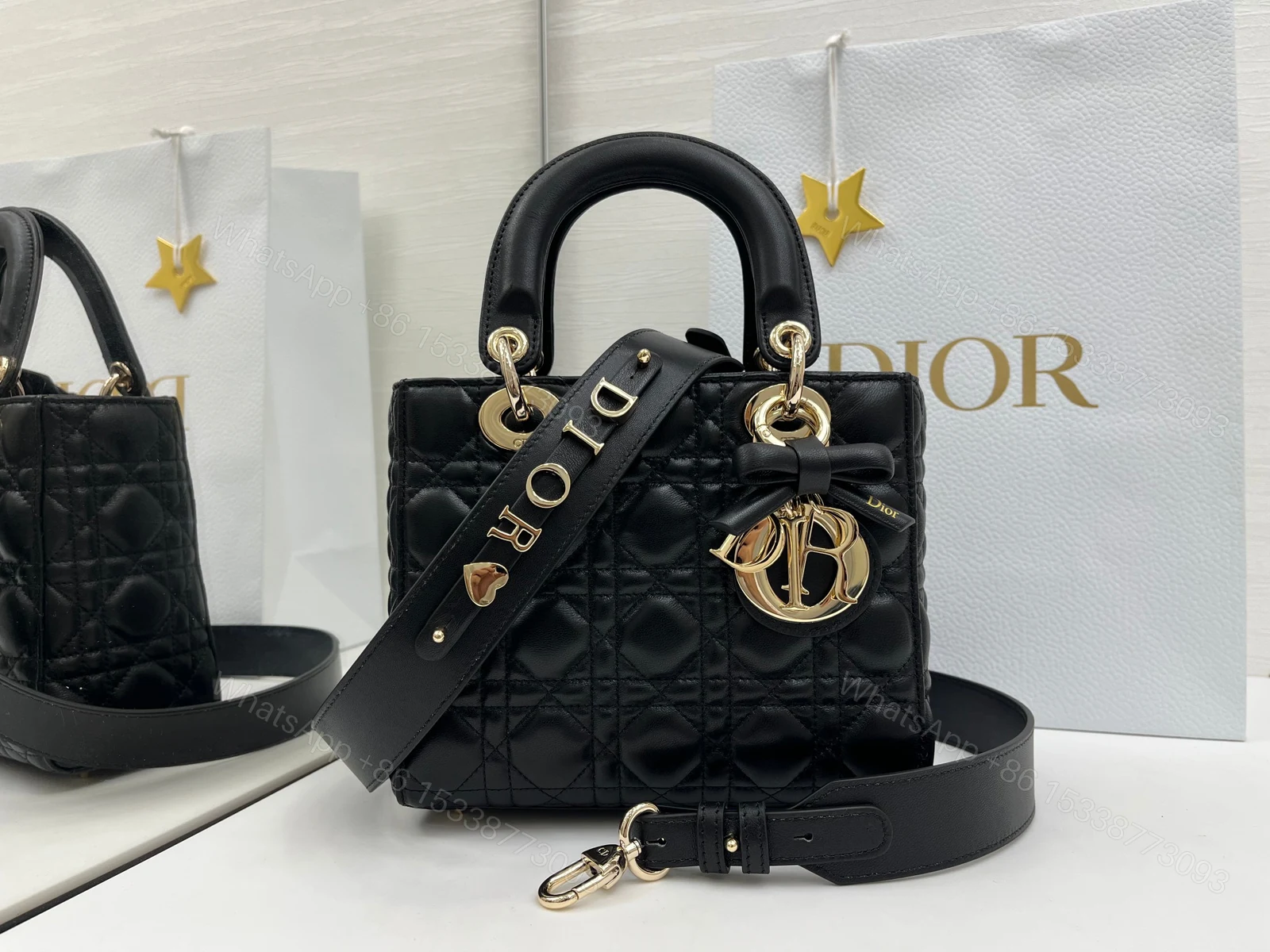原單Dior Lady D-Joy黑色羊皮包 極簡蝴蝶結吊飾斜背設計 — view 1