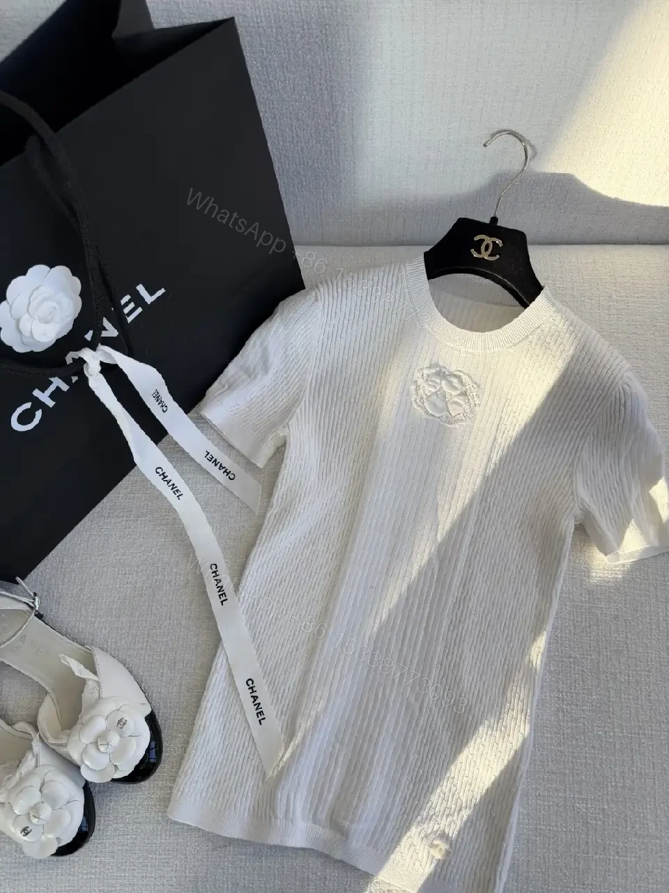 Knit T-Shirt Dress: Subtle Emblem, Elevated Texture, All-Day Sophistication — view 1