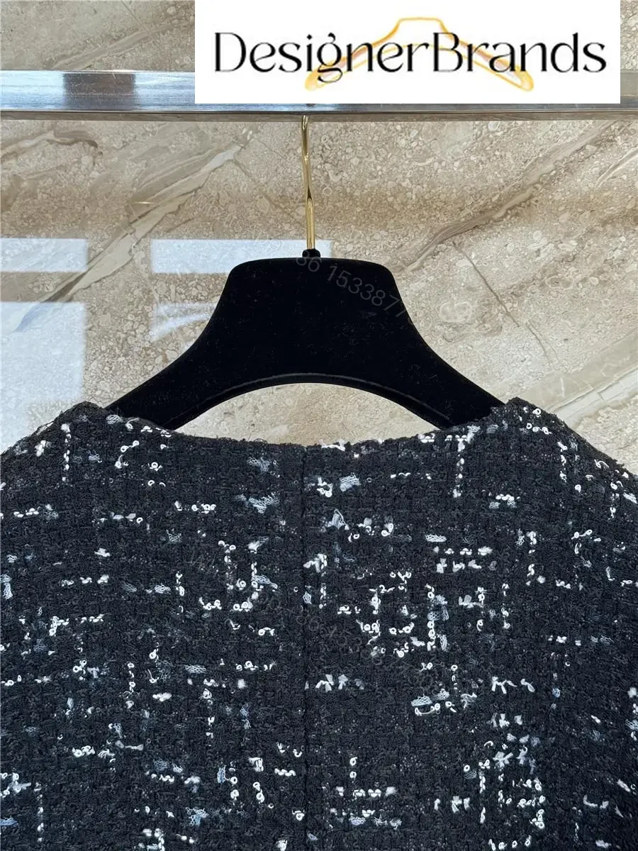 View 9 of Textured Tweed Jacket: Sophisticated City-Chic Style
