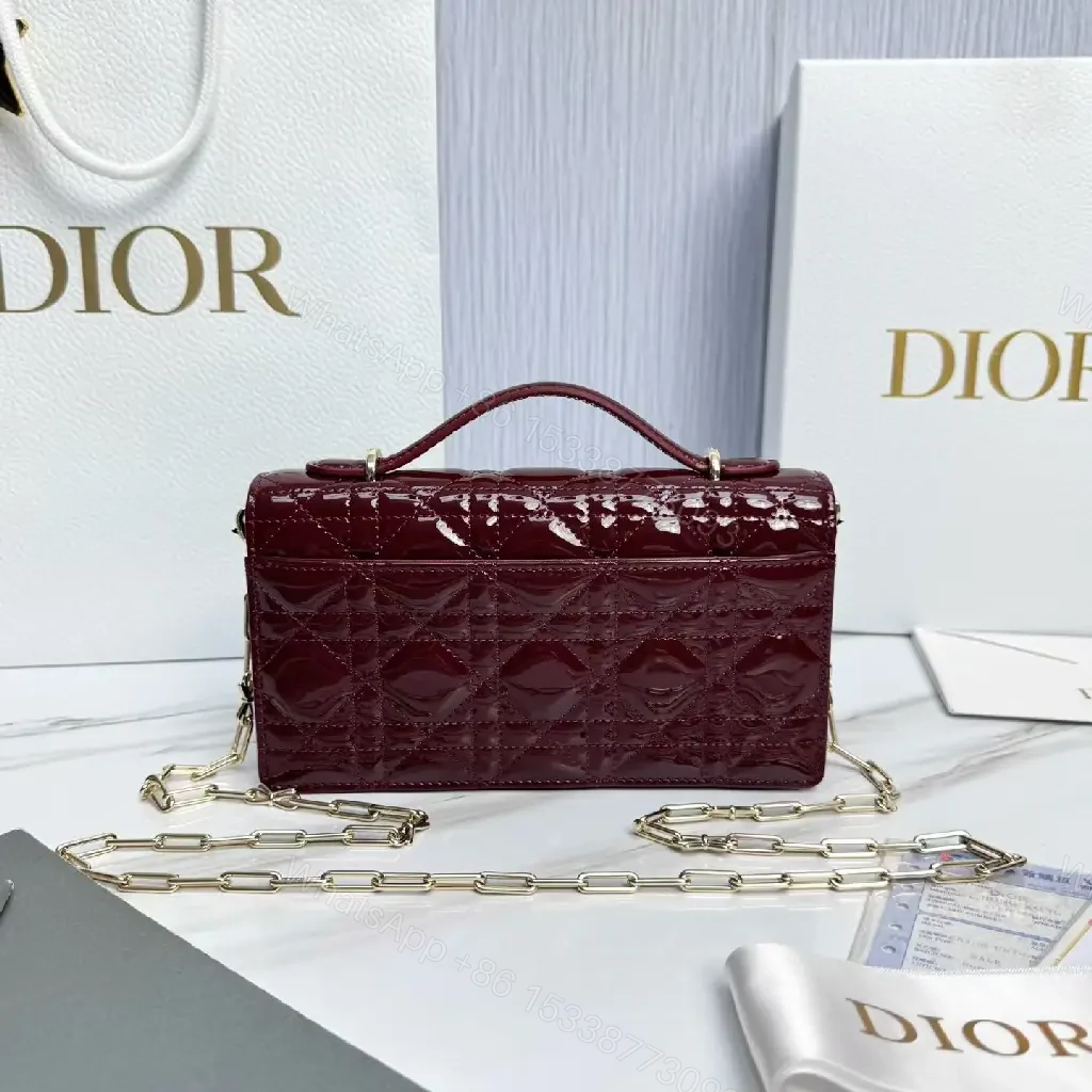 View 8 of Glossy Burgundy Quilted Mini Bag with Bow Accent