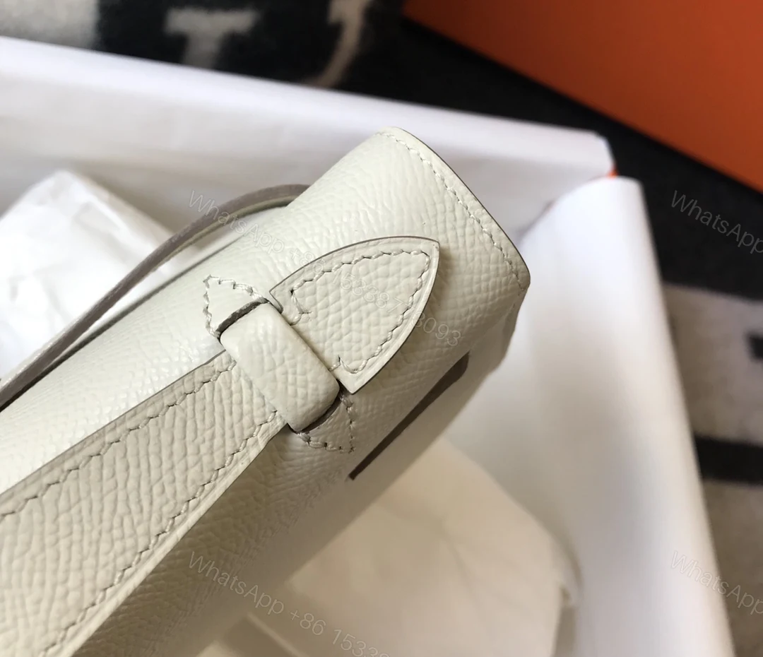View 2 of HERMES MINI KELLY POCHETTE GOLD TONED HARDWARE WHITE 22CM