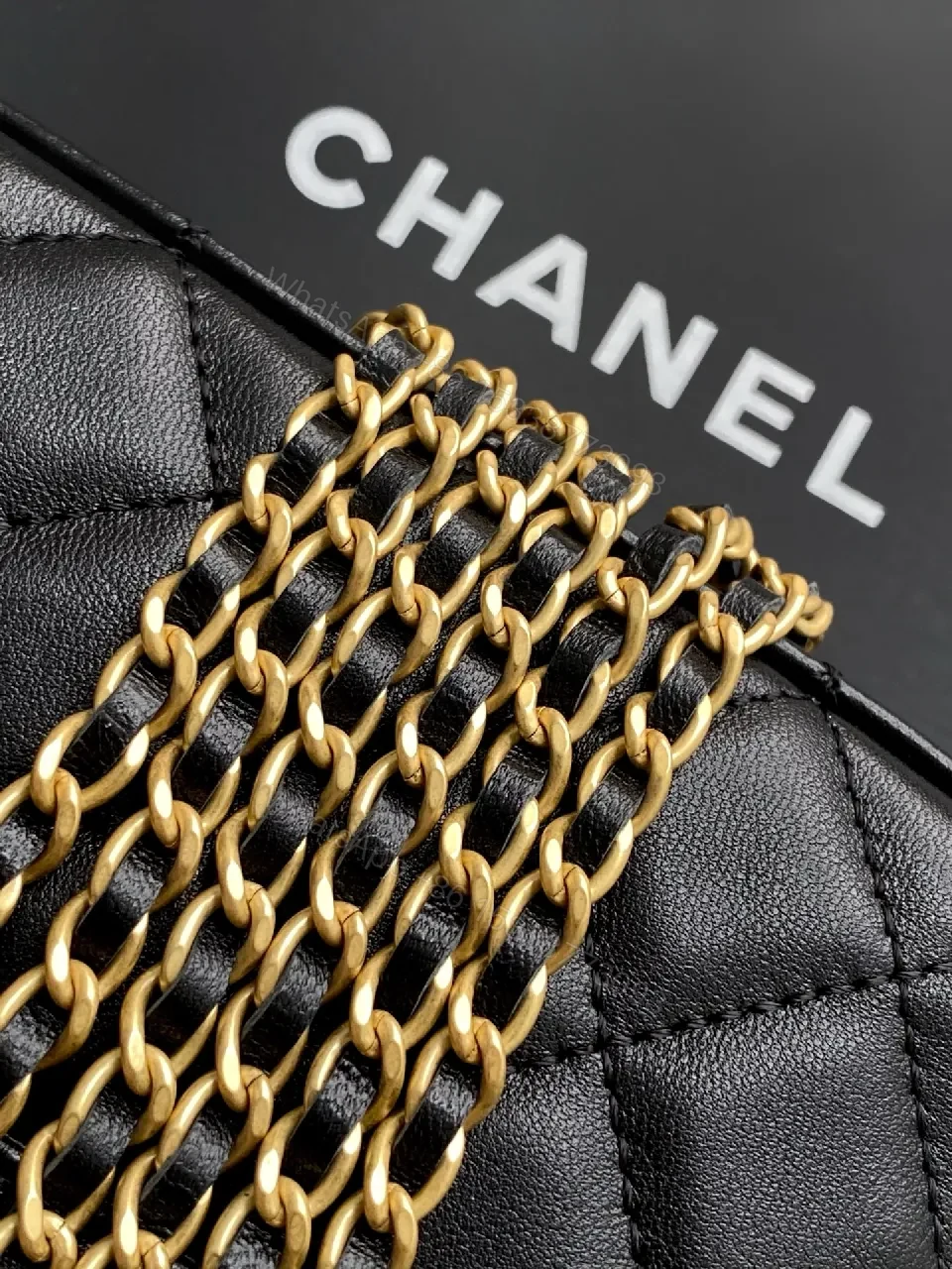 View 2 of Black Quilted Mini Handbag with Gold Hardware, Chain Strap