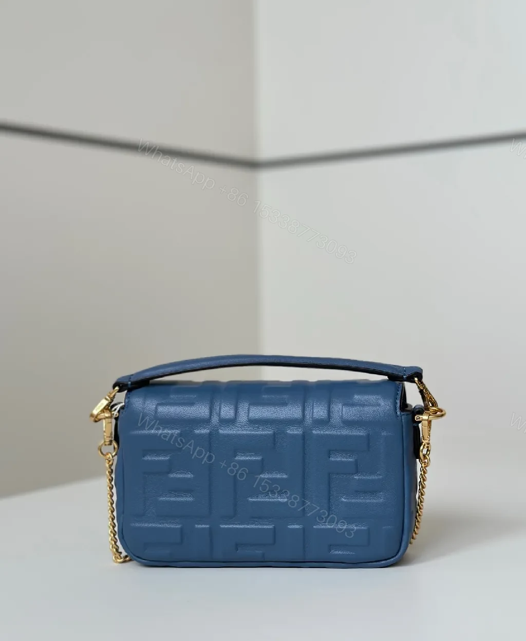 View 2 of Blue Leather Crossbody with Monogram Texture, Luxury Style