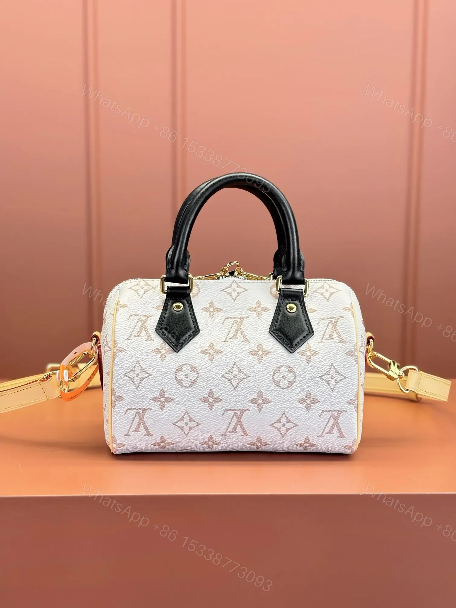 View 2 of Louis Vuitton Monogram Dune Speedy Bandoulière 20