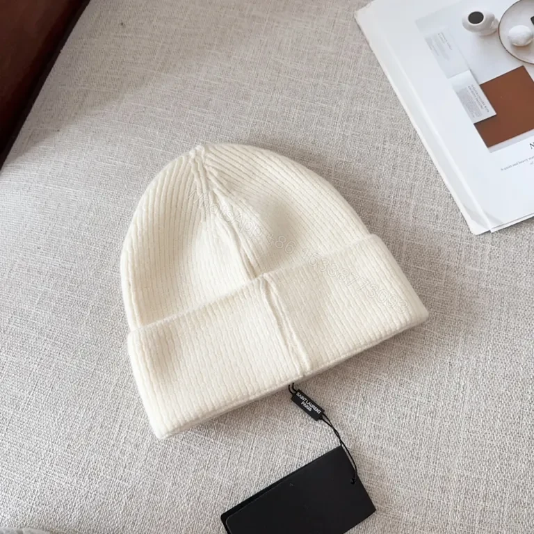 View 2 of Minimalist Knit Beanie â€” Ivory, Premium Knit Blend, Crest Logo, Everyday Luxury