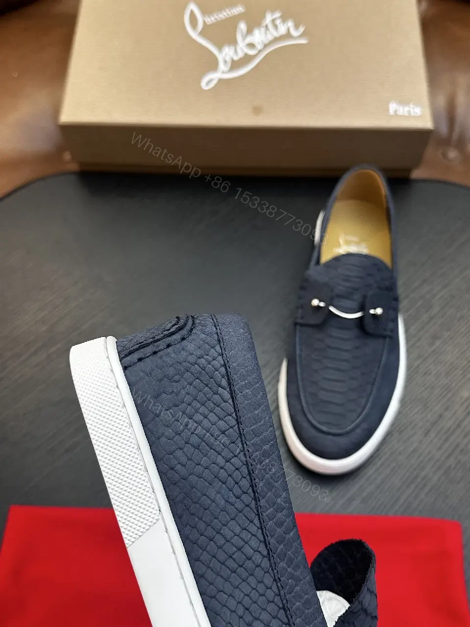 View 4 of black crocodile-embossed leather loafer with tassel slip-on for everyday luxury