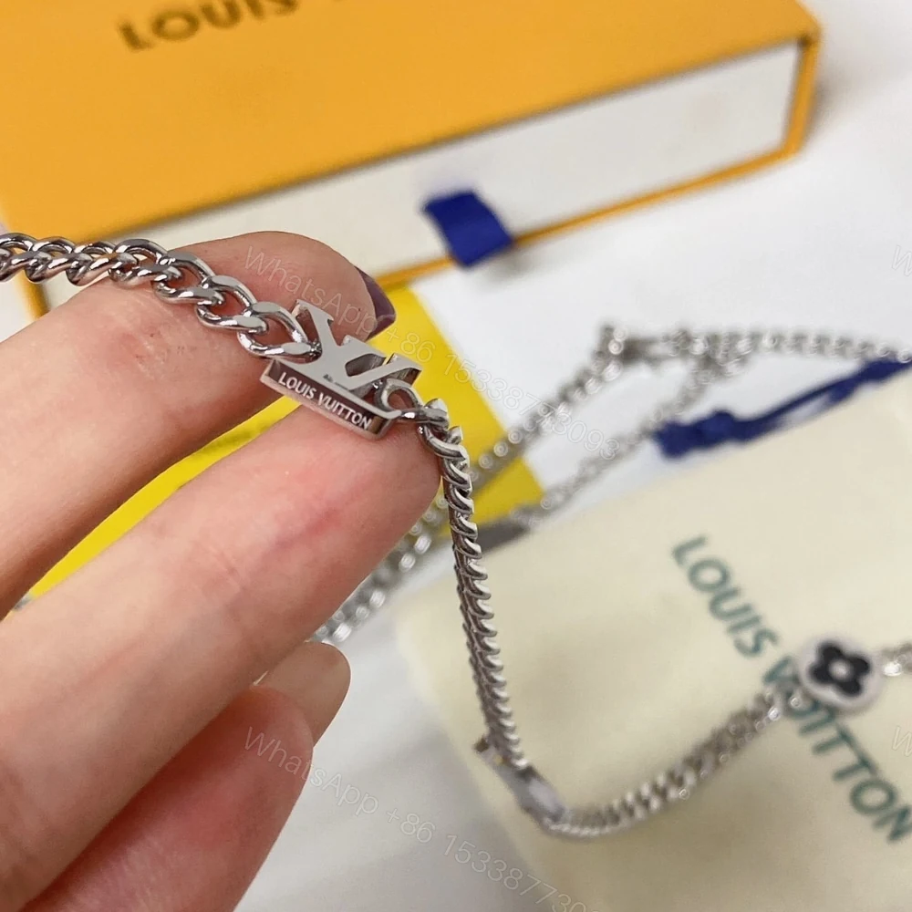 View 5 of LOUIS VUITTON LV SPIKE CHARMS NECKLACE SILVER M01717