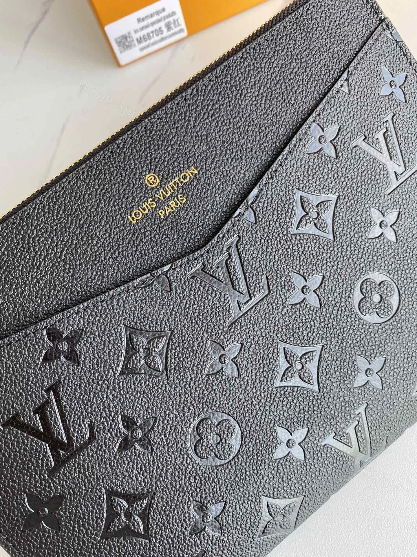 View 5 of Louis Vuitton Empreinte Daily Pouch Black