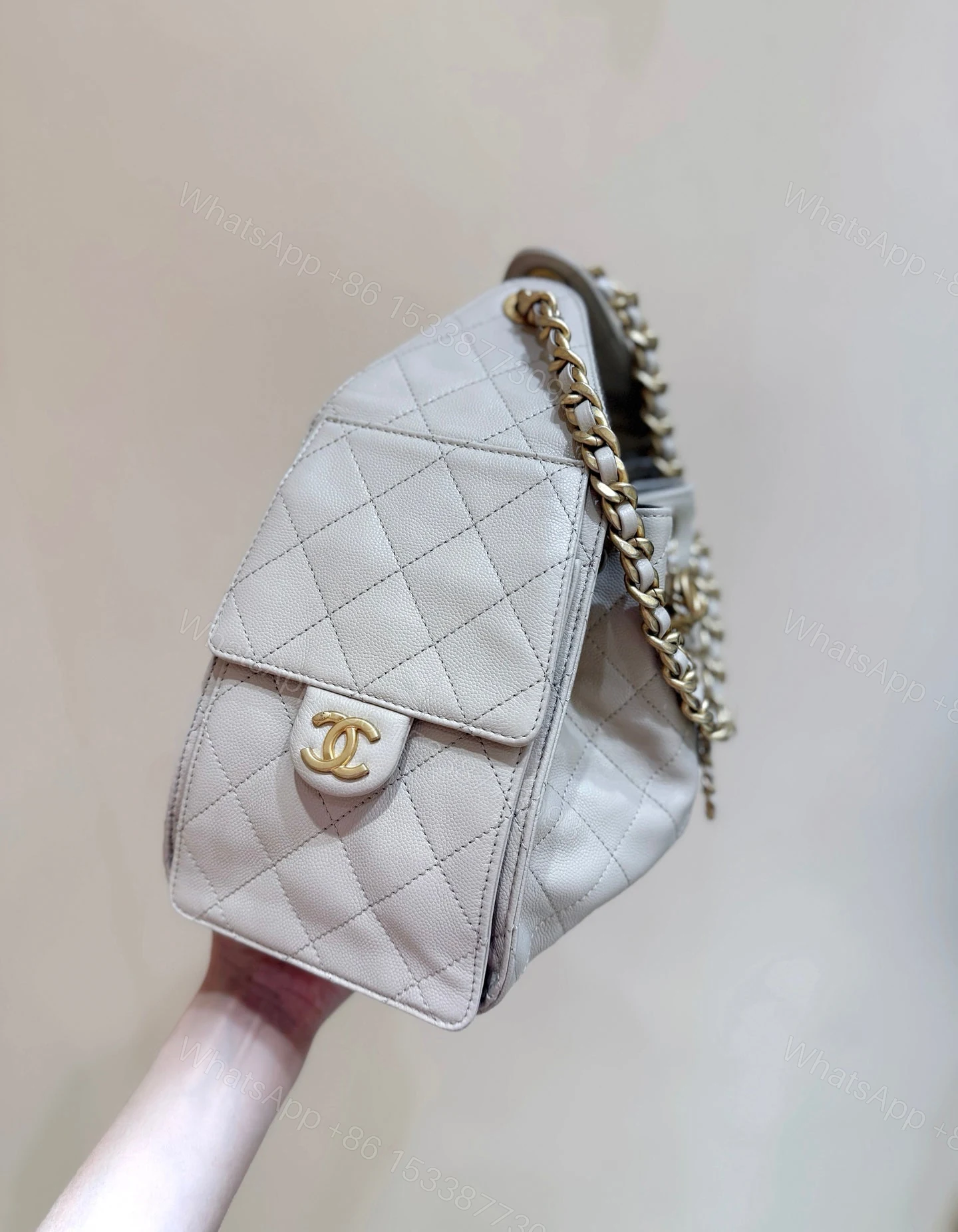 View 4 of CHANEL 25 HANDBAG IN CREAM 30 GRAINED CALFSKIN GOLD HARDWARE