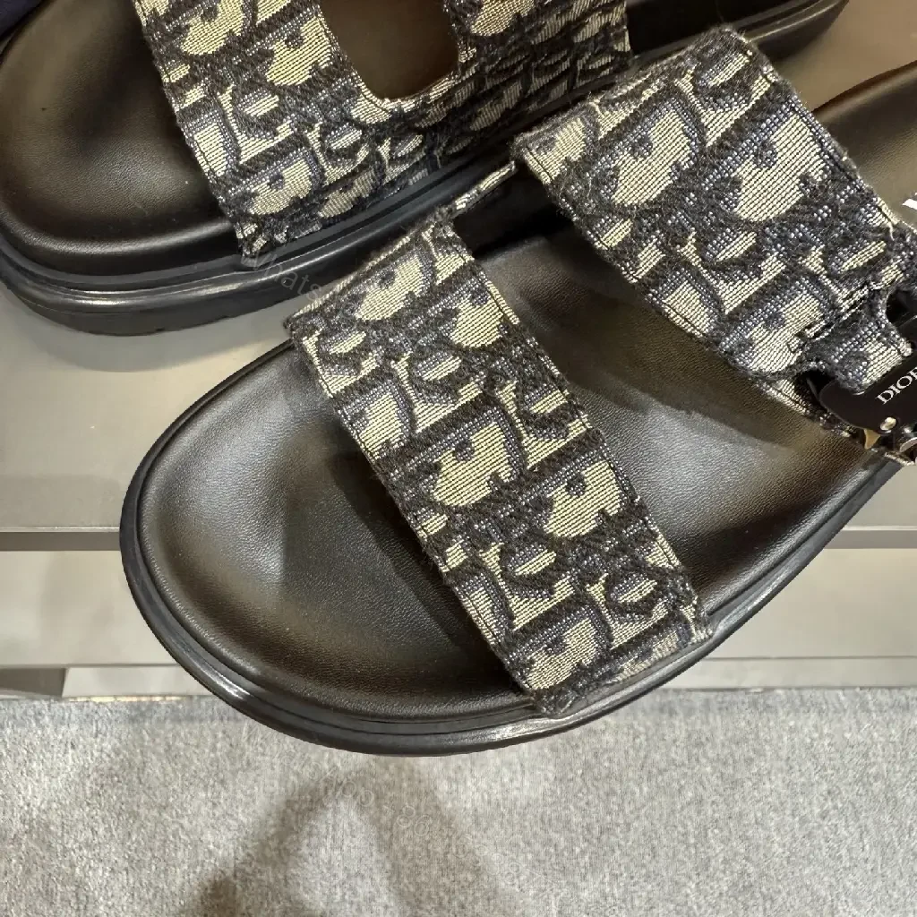 View 5 of Monochrome Monogram Slides: Sleek Signature Details