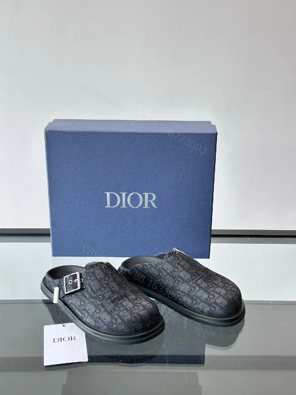 View 8 of Dark Monogram Slip-Ons: Textured Mules with Subtle Buckle