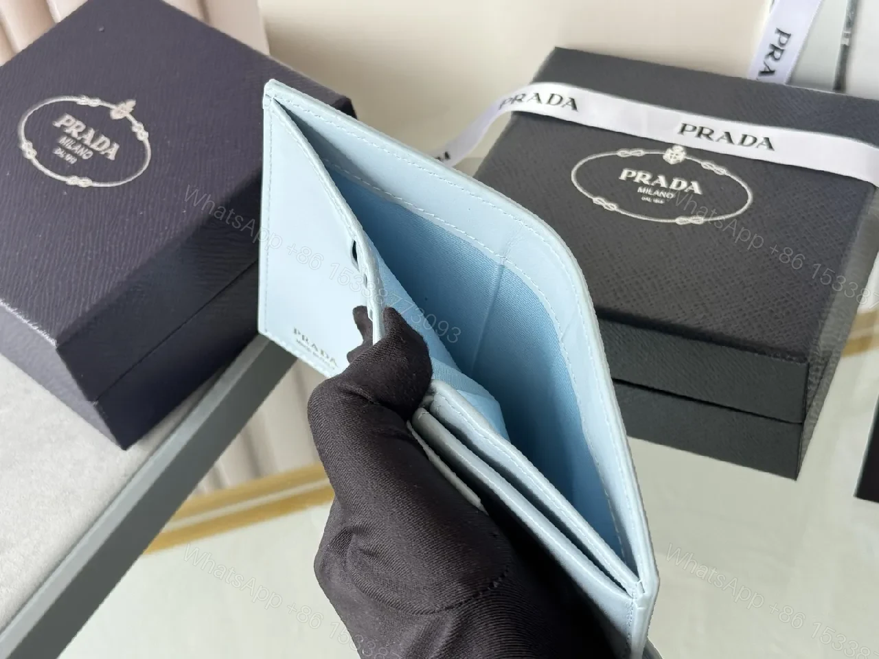 View 6 of Blue Saffiano-Like Bifold Wallet with Triangle Closure, Minimal Luxury