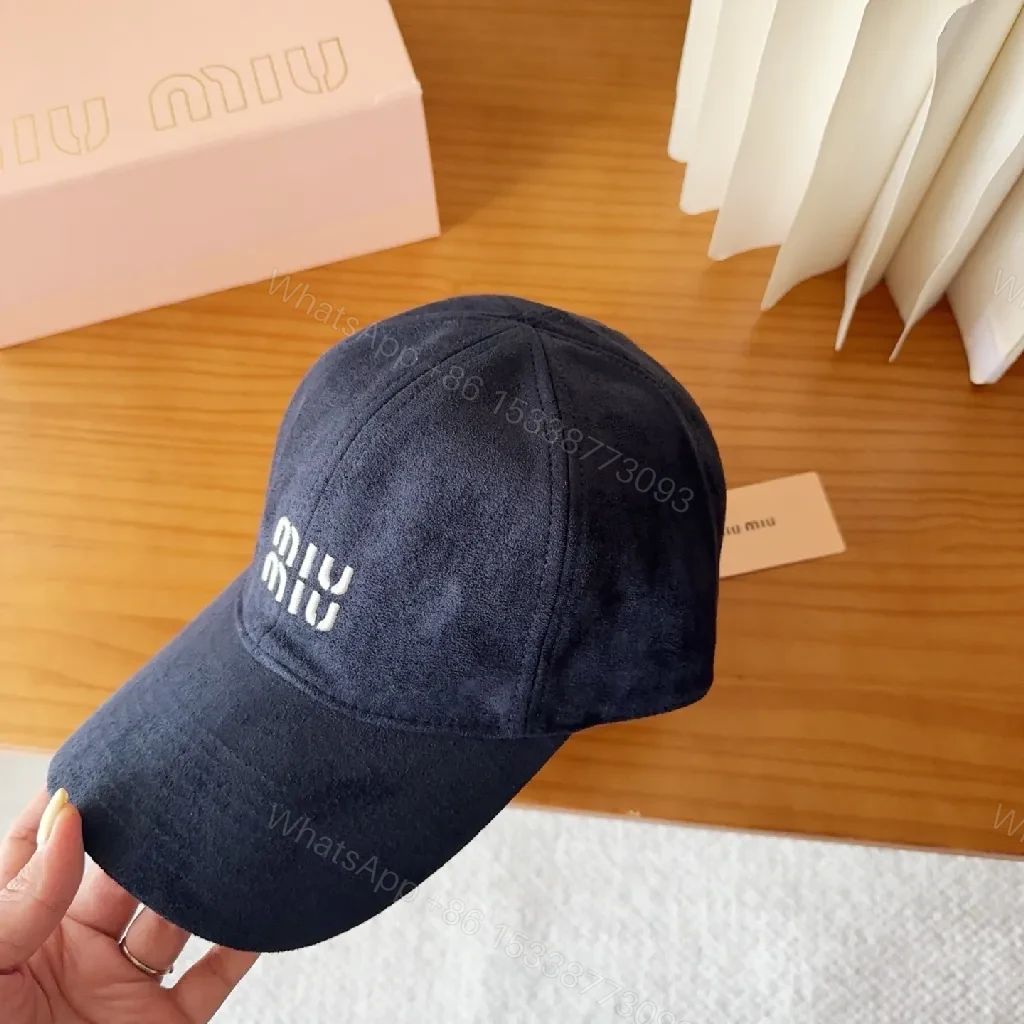 View 2 of Soft-Structured Navy Cap with Minimal Embroidery Details