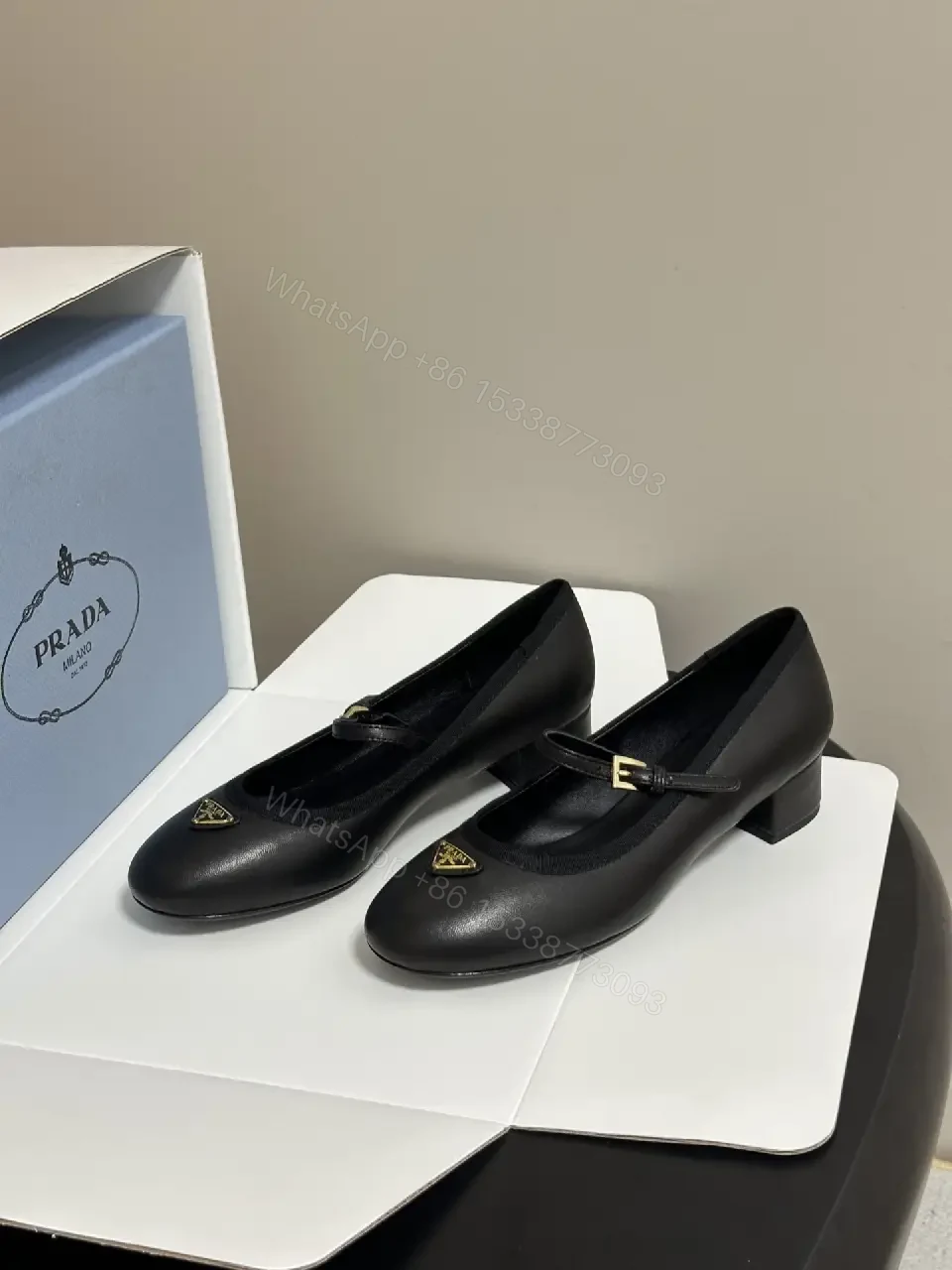 View 4 of Black Leather Mary Jane Heels with Logo Charm, Prada Style
