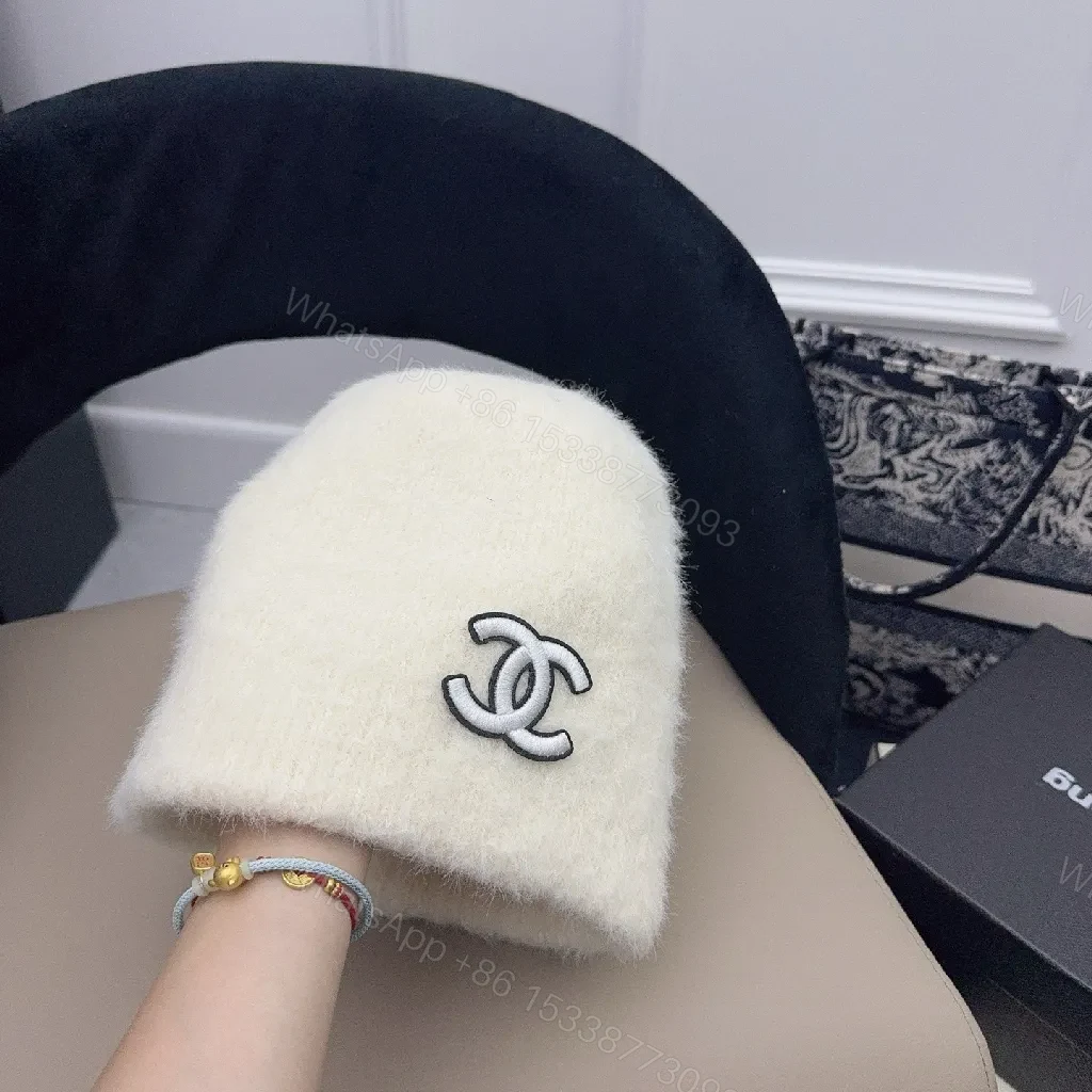 View 4 of Ivory Plush Handwarmer: Luxe Logo-Embossed, Lightweight Warmth