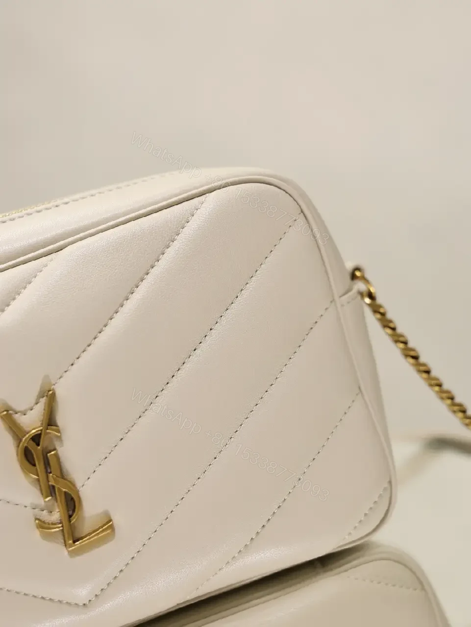 View 8 of Off-White Cream Quilted Chevron Crossbody Bag with Gold Logo