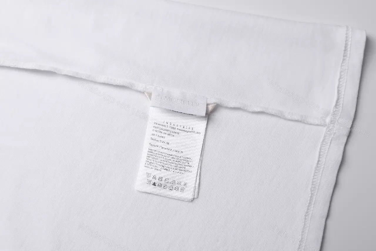 View 10 of White Cotton Moncler Tee: Subtle Luxury Everyday Comfort
