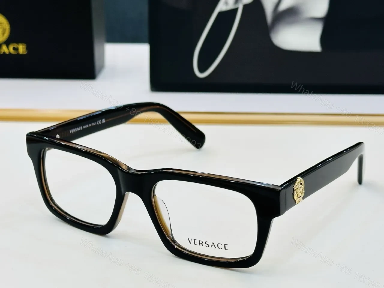 View 2 of Elegant Black Acetate Frames – Gold Medusa Detail, Rectangular