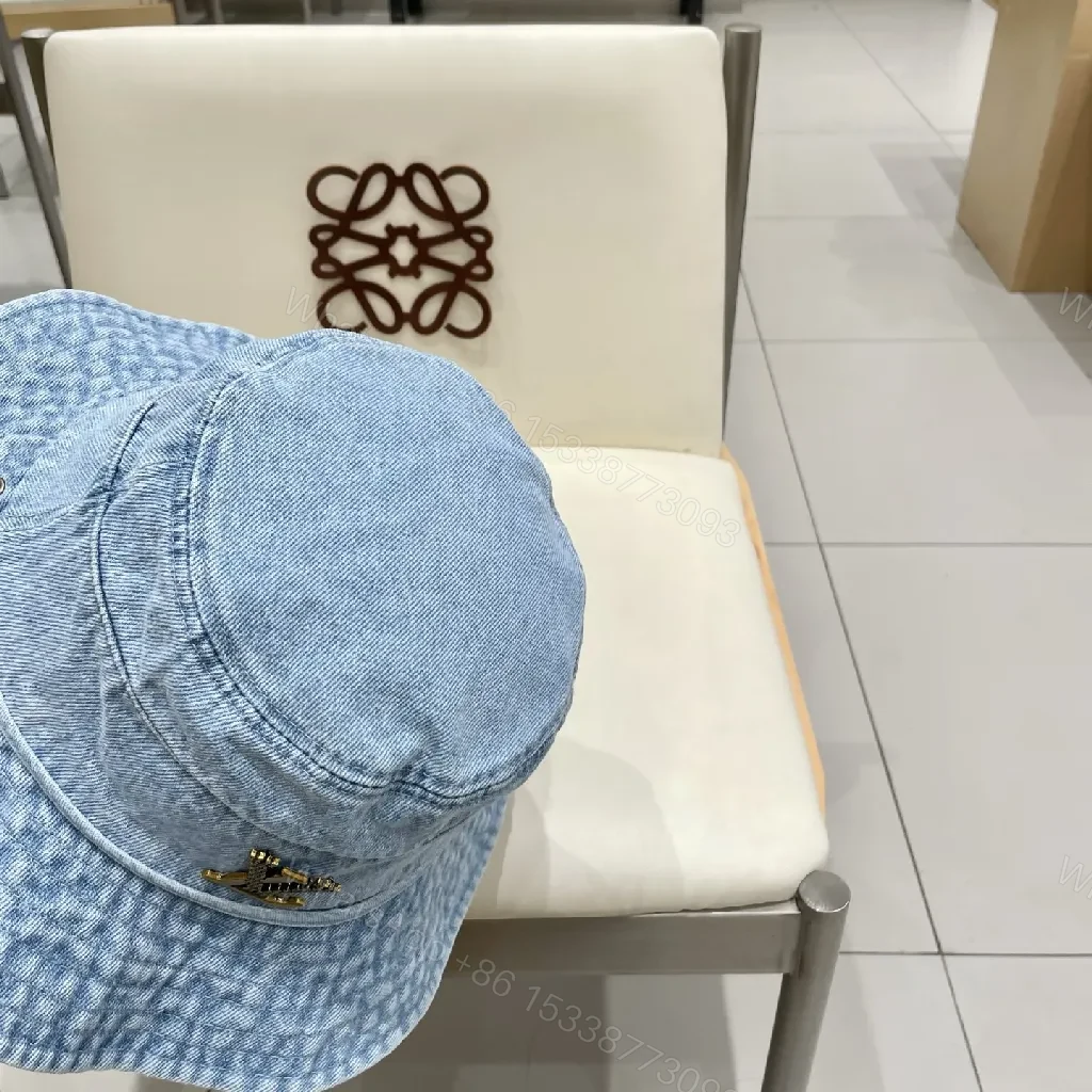 View 3 of Denim Bucket Hat + Gold Emblem + Casual Luxe + Iconic Accent + Hat
