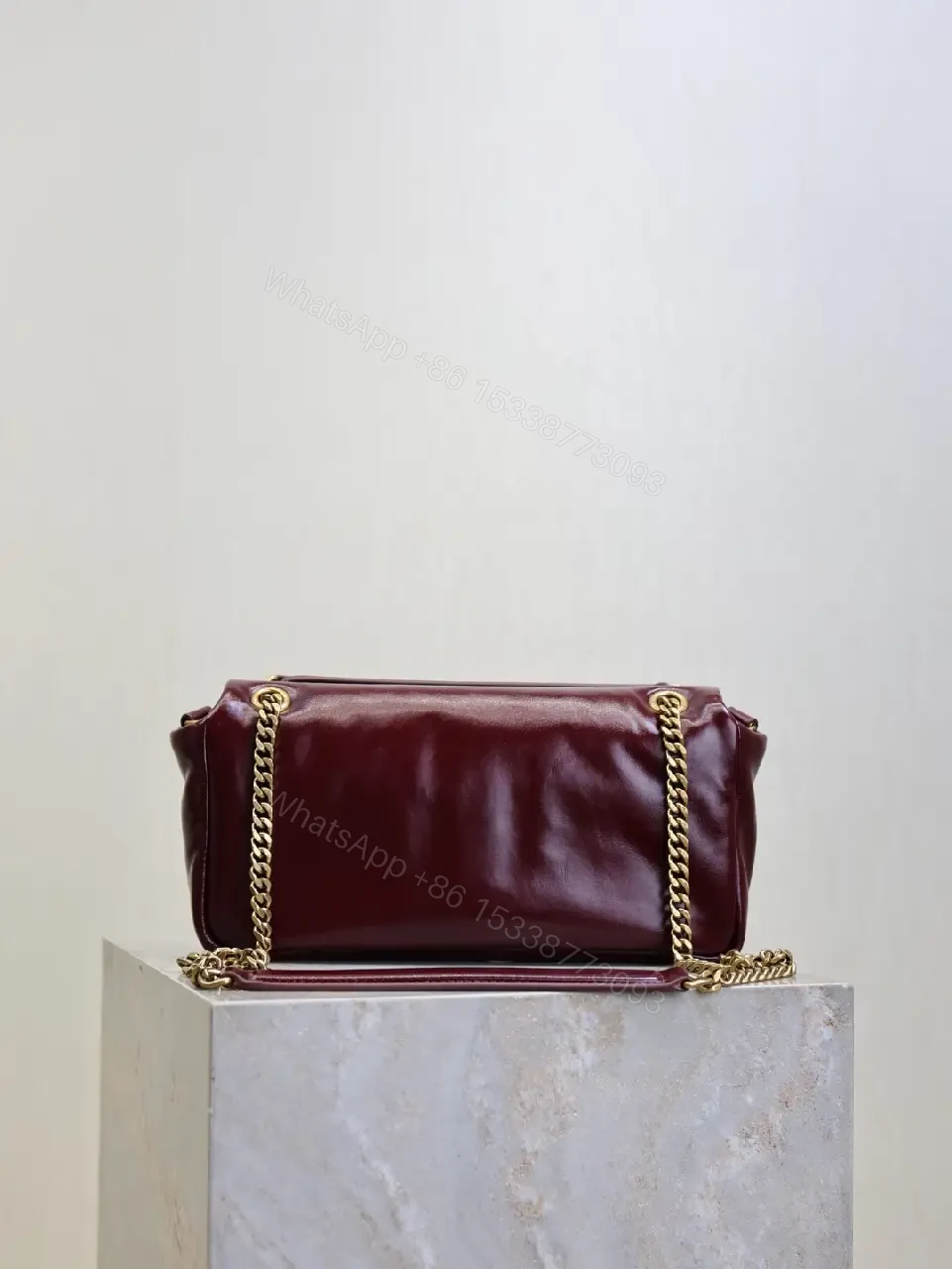 View 8 of Burgundy Calfskin Compact Shoulder Bag with Gold Hardware
