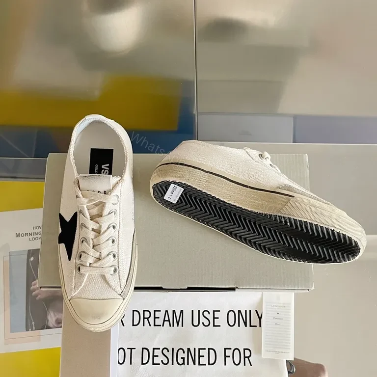 View 9 of Chic Canvas Star Sneakers - Signature Detail, Unisex