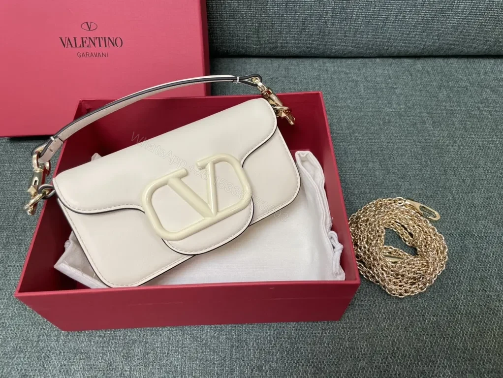 View 3 of Bold Red Leather Bag with Signature V Buckle - Luxury Crossbody