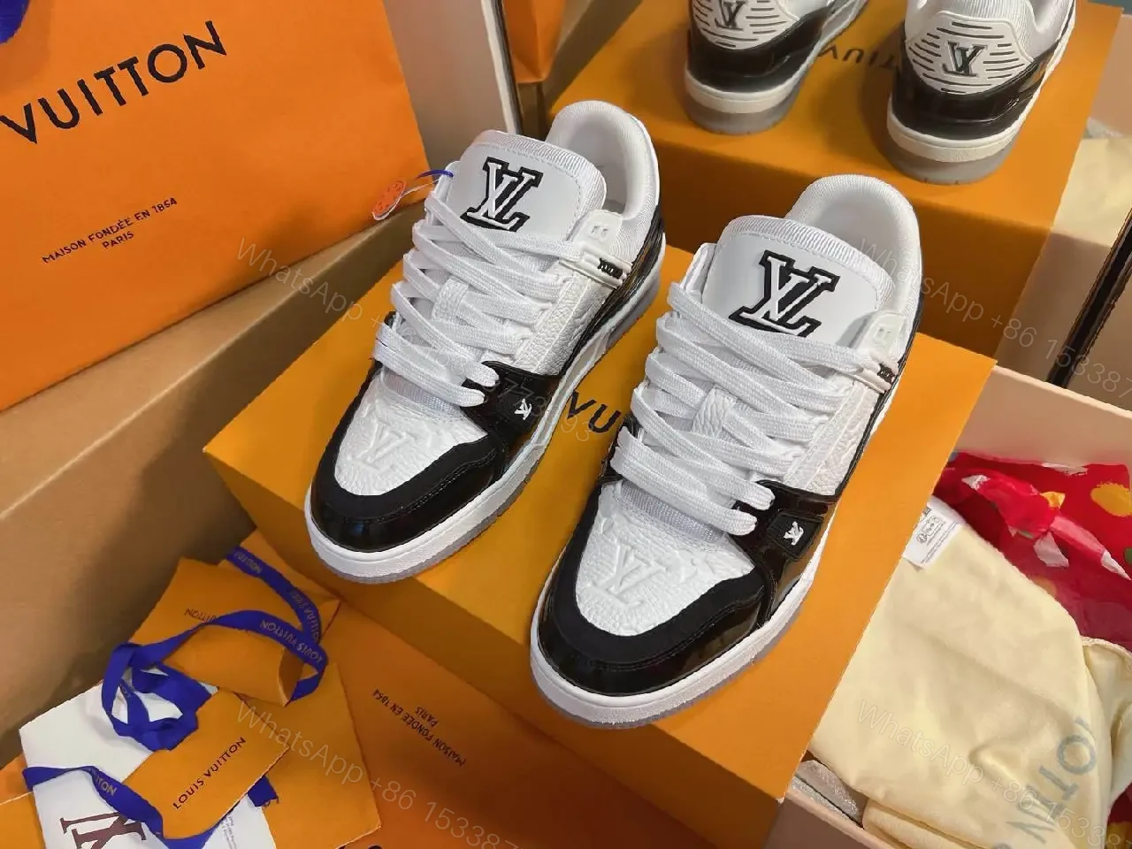 Two-Tone Luxe Sneaker: Premium Comfort & Monogram Accent — view 1