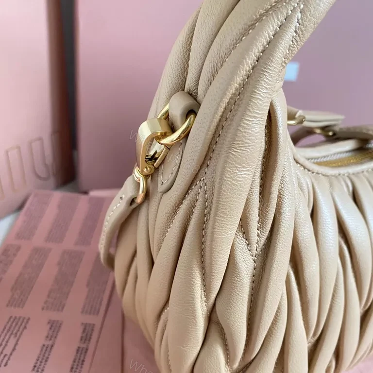 View 6 of Chic Quilted Leather Bag: Compact Luxury, Blush, Miu Miu Style