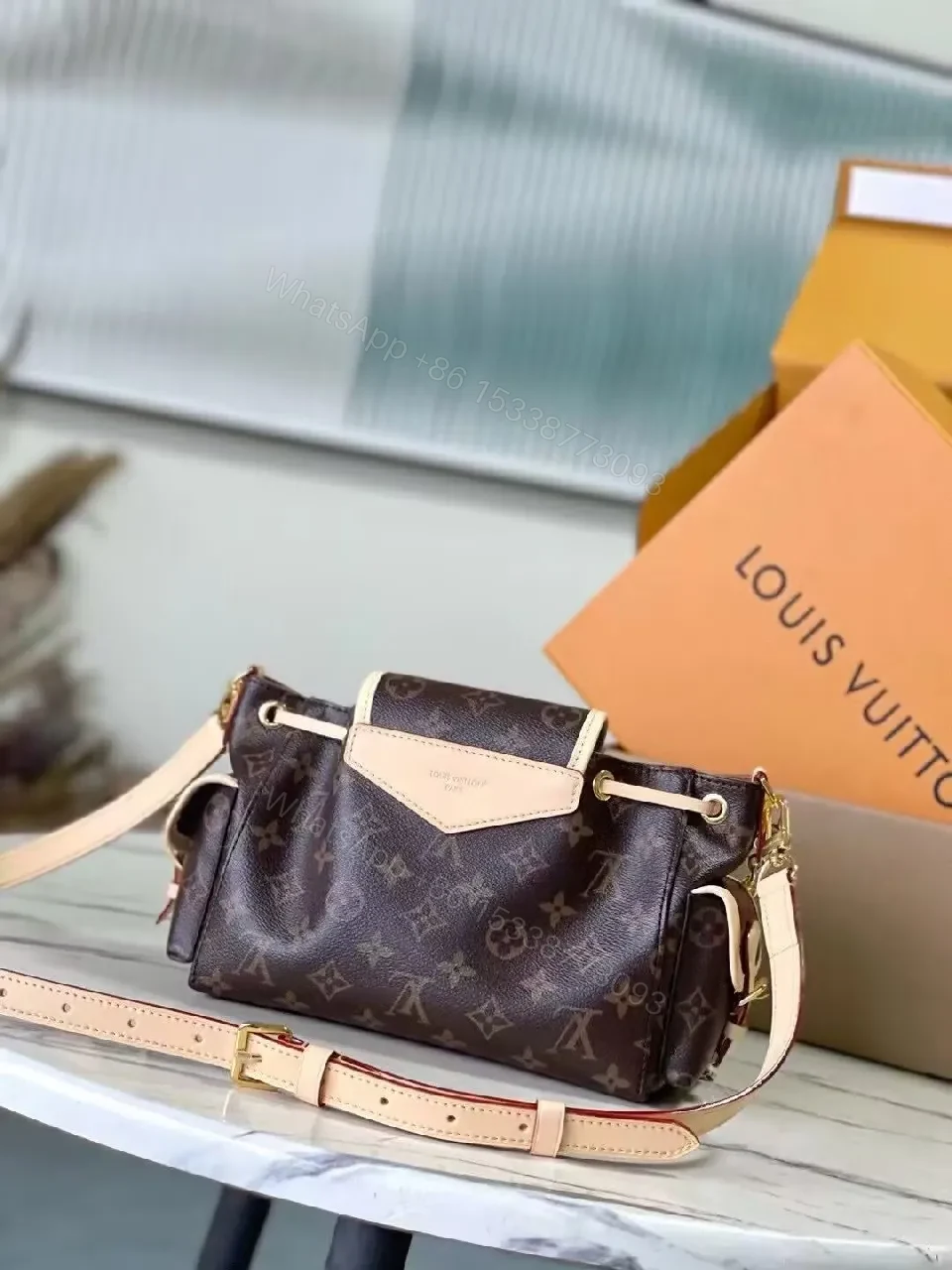 View 5 of Compact Monogram Crossbody Bag – Luxe Everyday Style