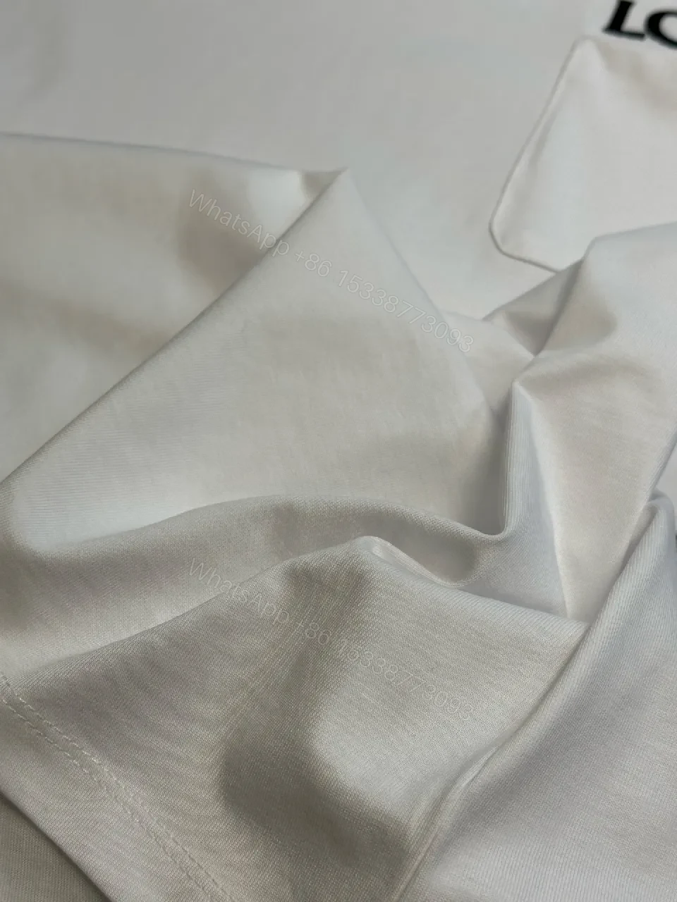 View 10 of White Cotton Tee Dress, Minimalist, LOEWE-inspired Pocket