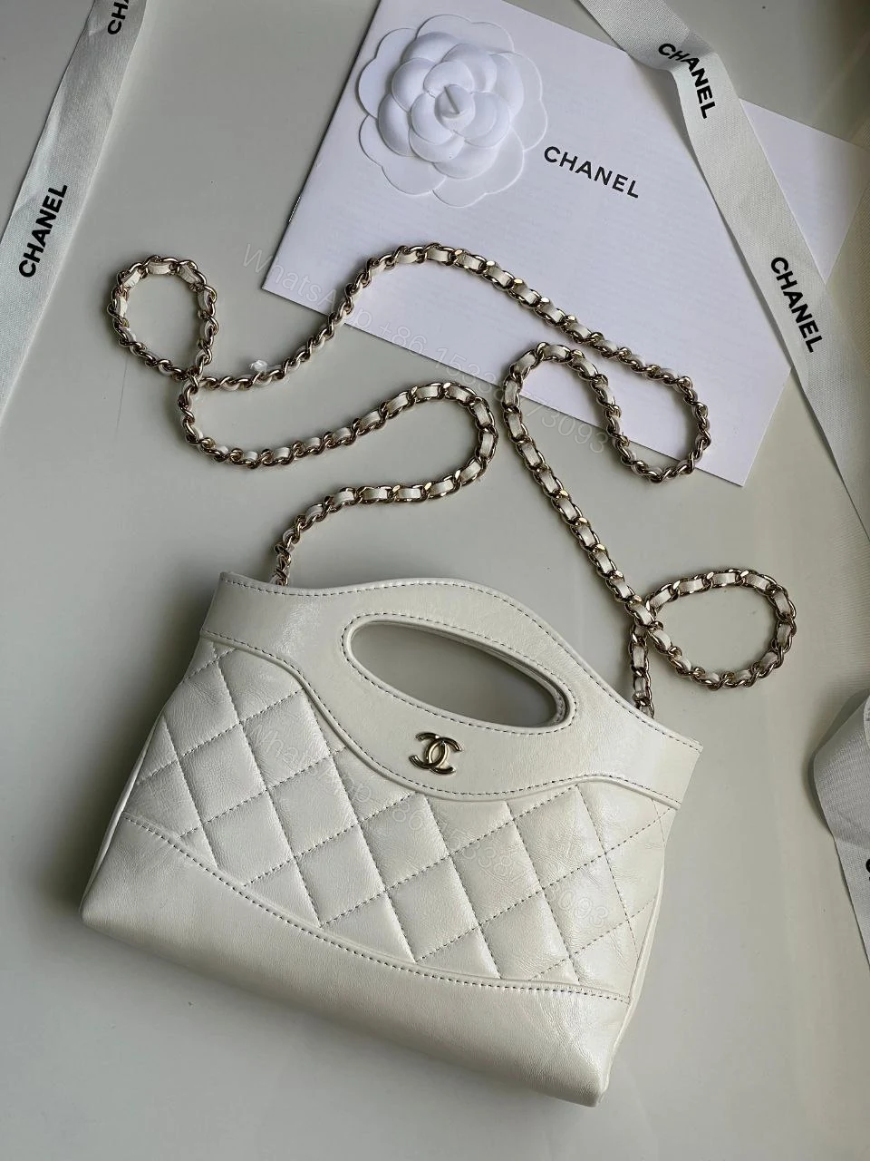 View 4 of Chanel 2024 Nano 31 Shopping Bag
