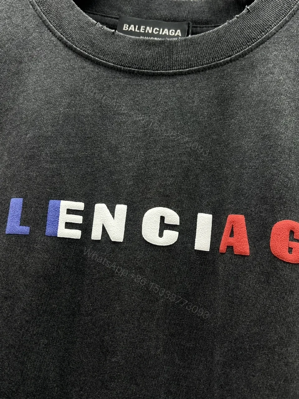 View 10 of Vintage Black Logo Tee | Soft Cotton Blend, Oversized Fit, Distressed Seamless