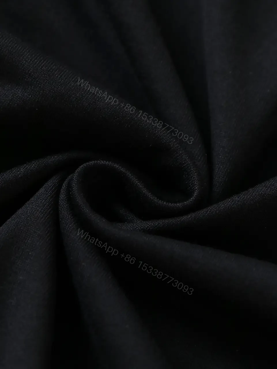 View 3 of Minimalist Black Cotton Tee: Logo-Embossed Luxury Top