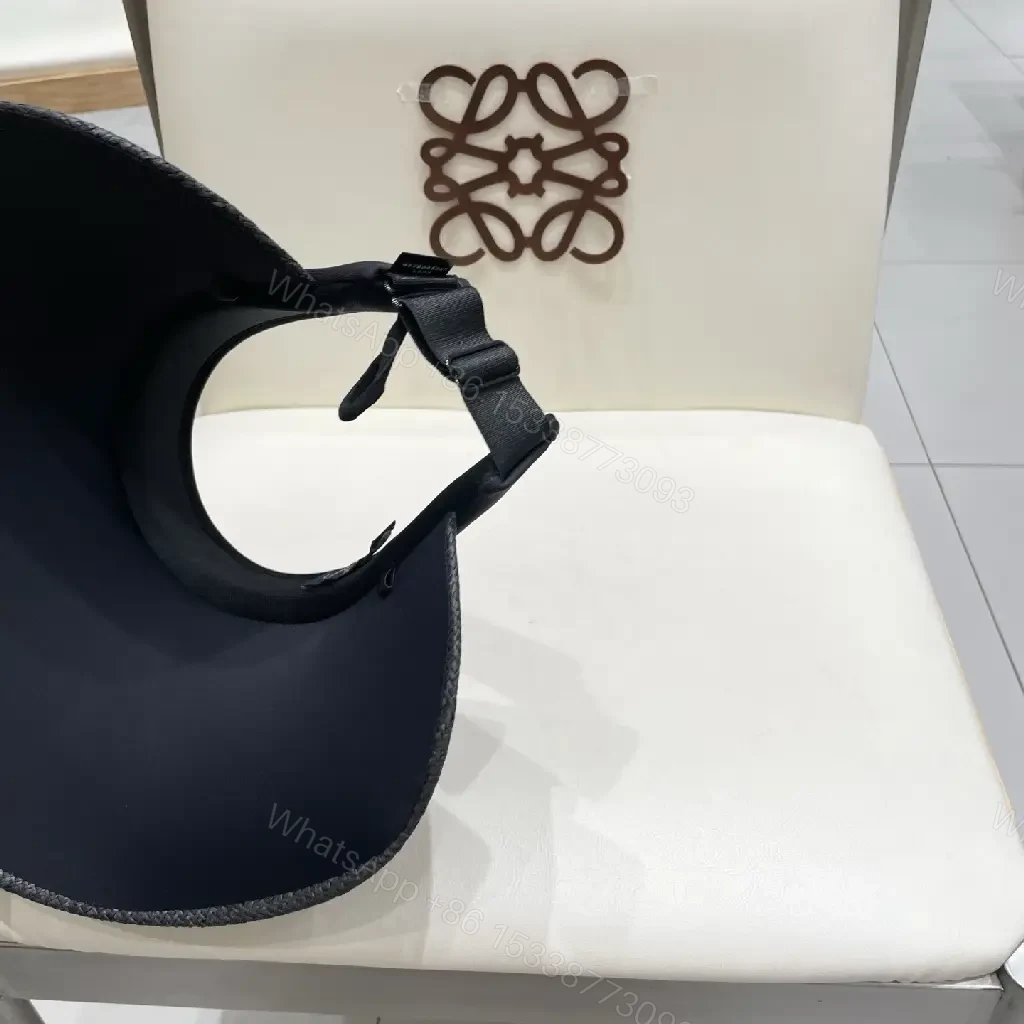 View 10 of Bold Sun Visor with LV Flair: Luxury-Casual Headwear