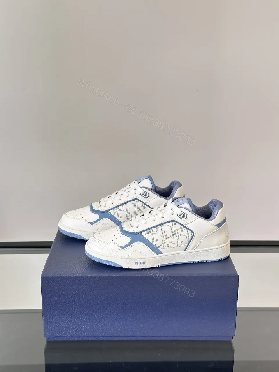 White & Sky Blue Leather High-Tops with Subtle Monogram Texture — view 1