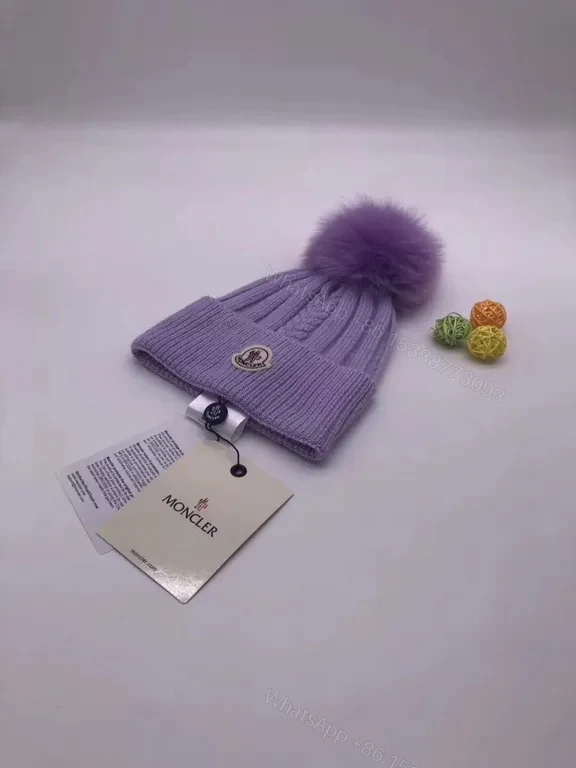 View 4 of Chic Black Moncler Knit Beanie â€” Plush Pom, Luxe Warmth