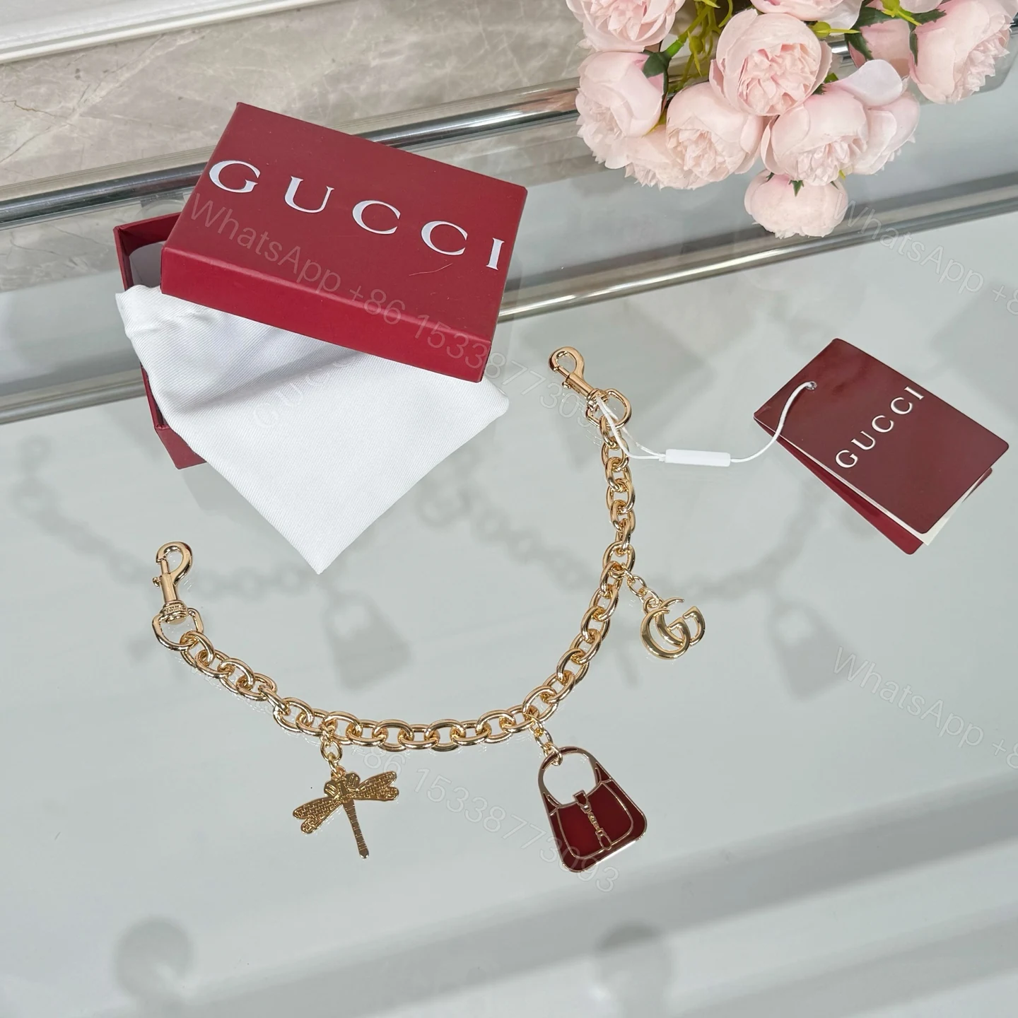 Gucci高仿女士金色吊飾手鍊 蜻蜓與包款吊飾點綴奢華風格 — view 1