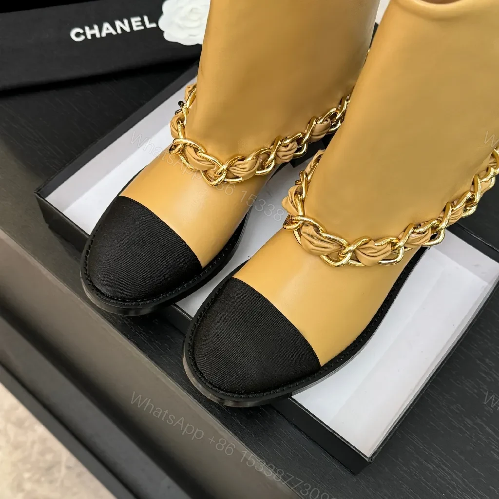 View 9 of Chic Tan Leather Boots with Black Toe Cap and Chain Detail