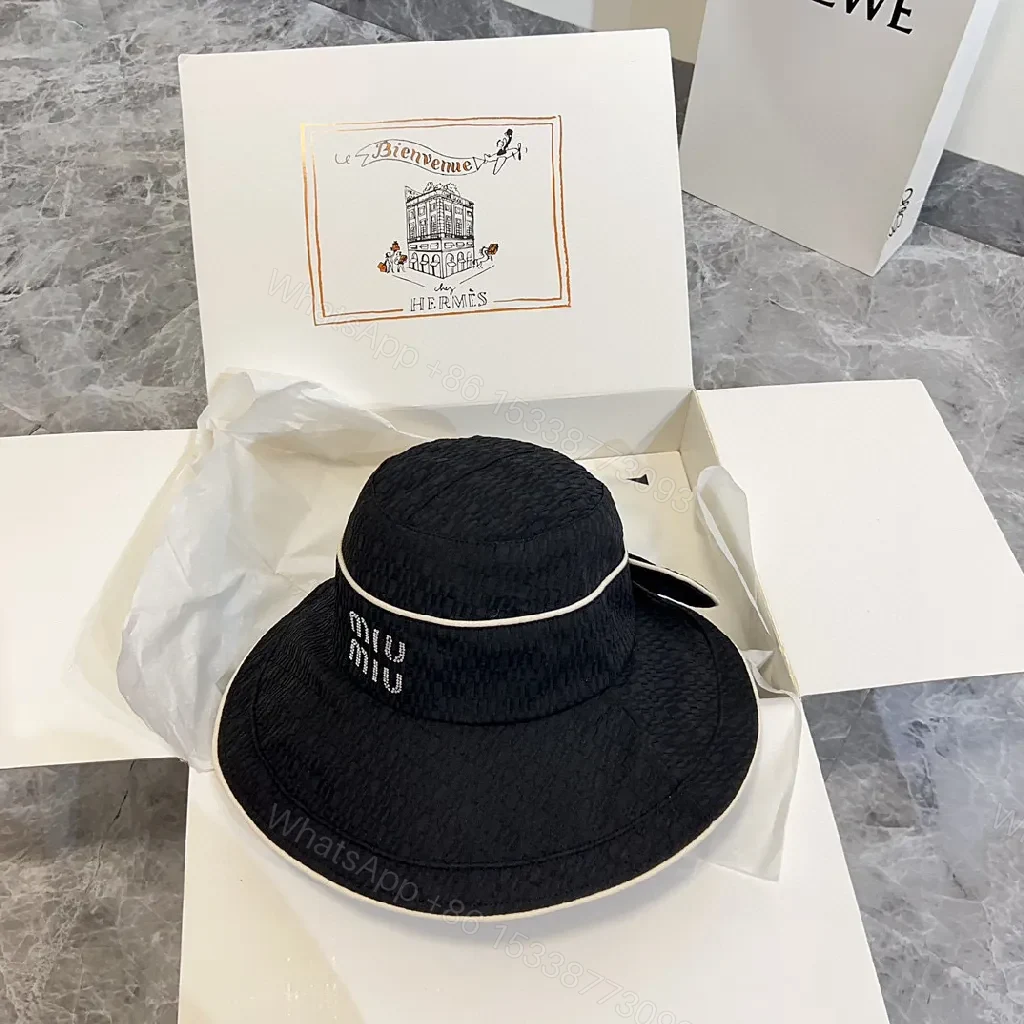 View 9 of Structured Black Straw Bucket Hat — Crystal Logo Accent, All-Season Style