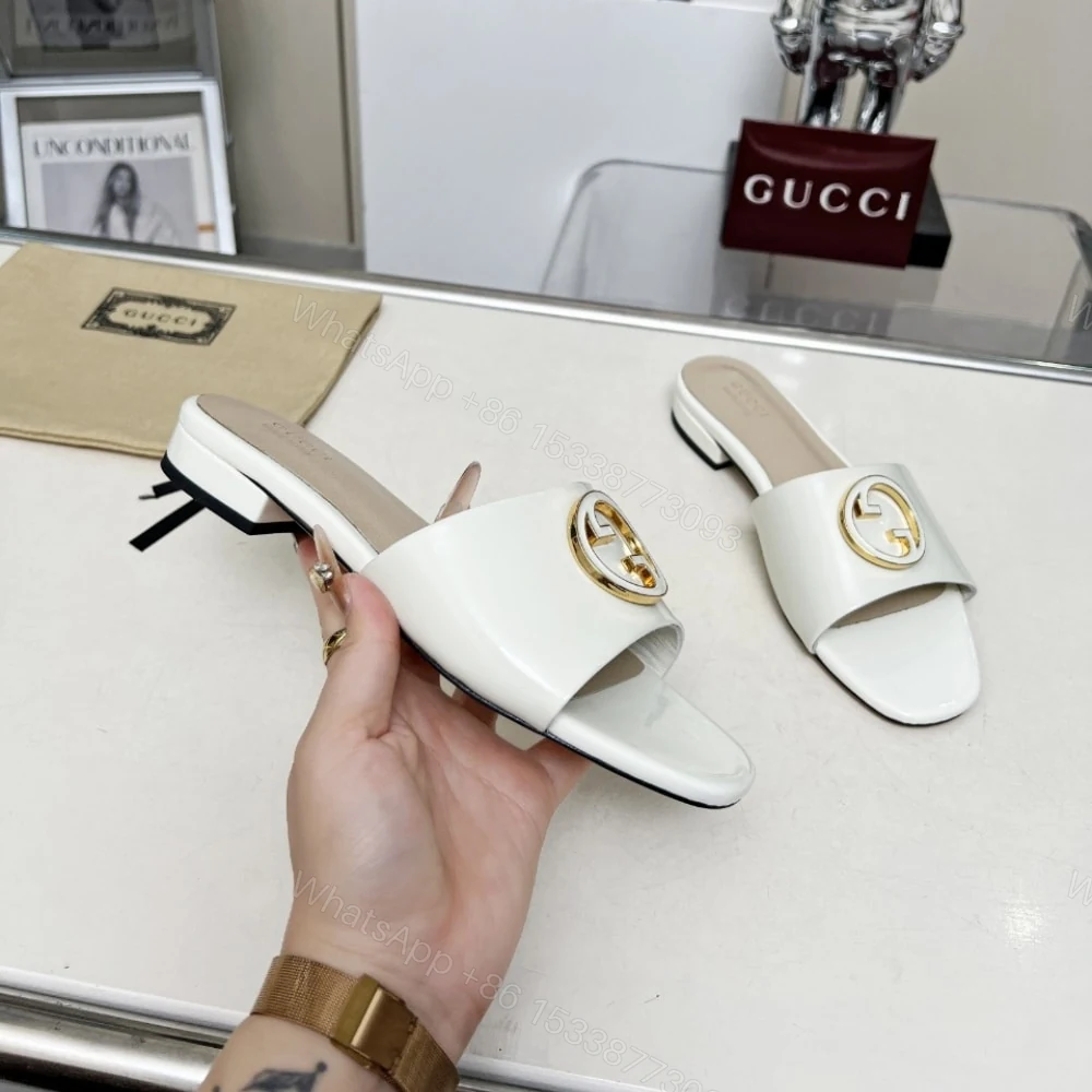 View 3 of GUCCI WOMEN ROUND INTERLOCKING G SANDAL IN WHITE