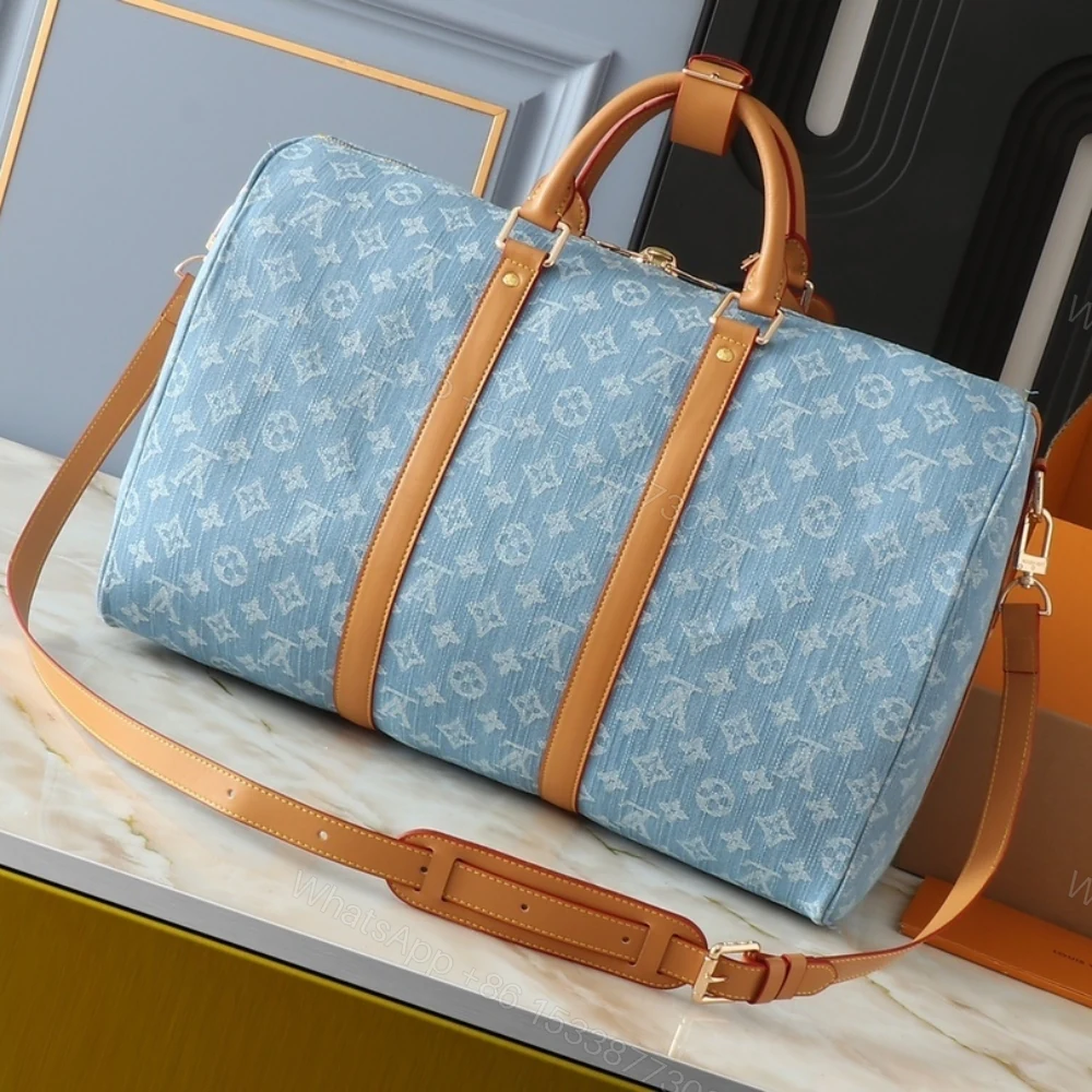 View 4 of Louis Vuitton Keepall Bandoulièrè 45 Bag Sky Blue Denim 45Cm M25334