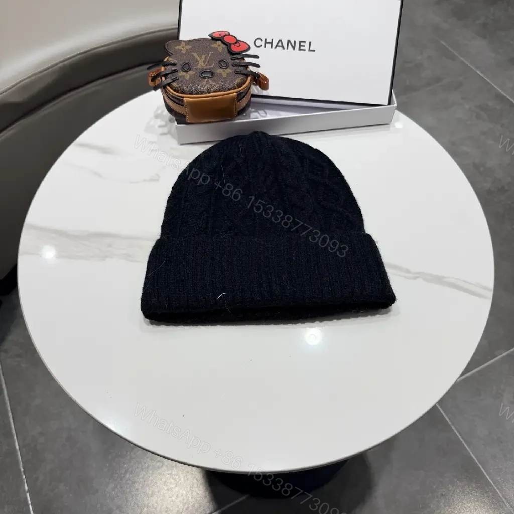View 3 of Black Knit Beanie with Subtle Crest – Lux, All-Season Comfort