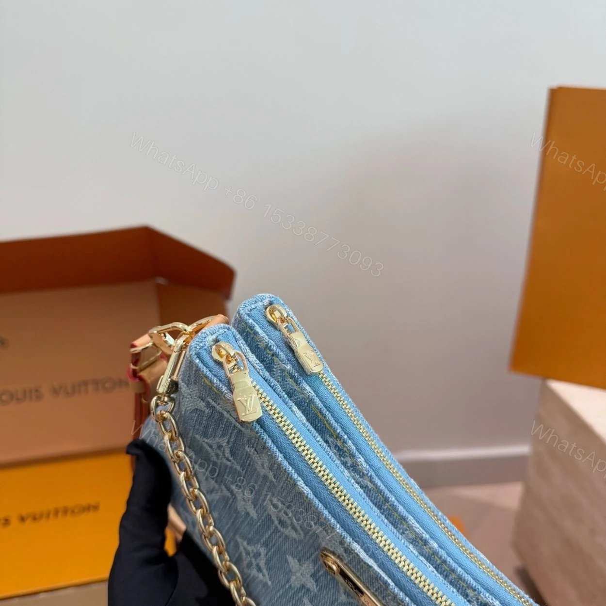 View 6 of Louis Vuitton Liv Pochette Blue Denim 25Cm M83532