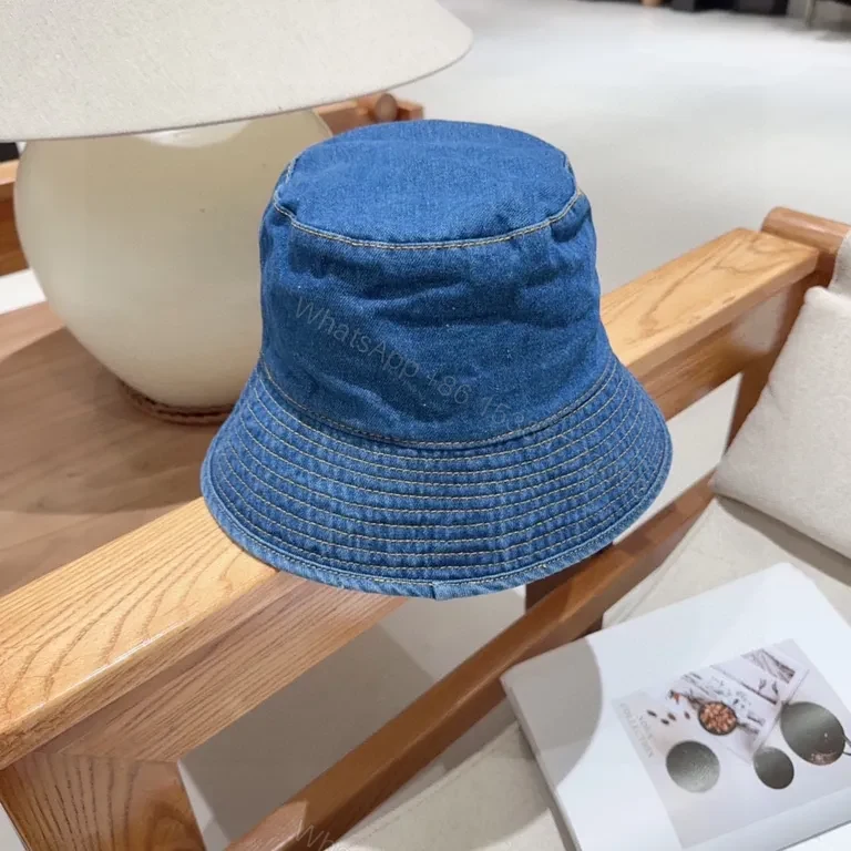 View 5 of Denim CELINE Lettering Bucket Hat â€“ Casual Luxury Sunglow Style