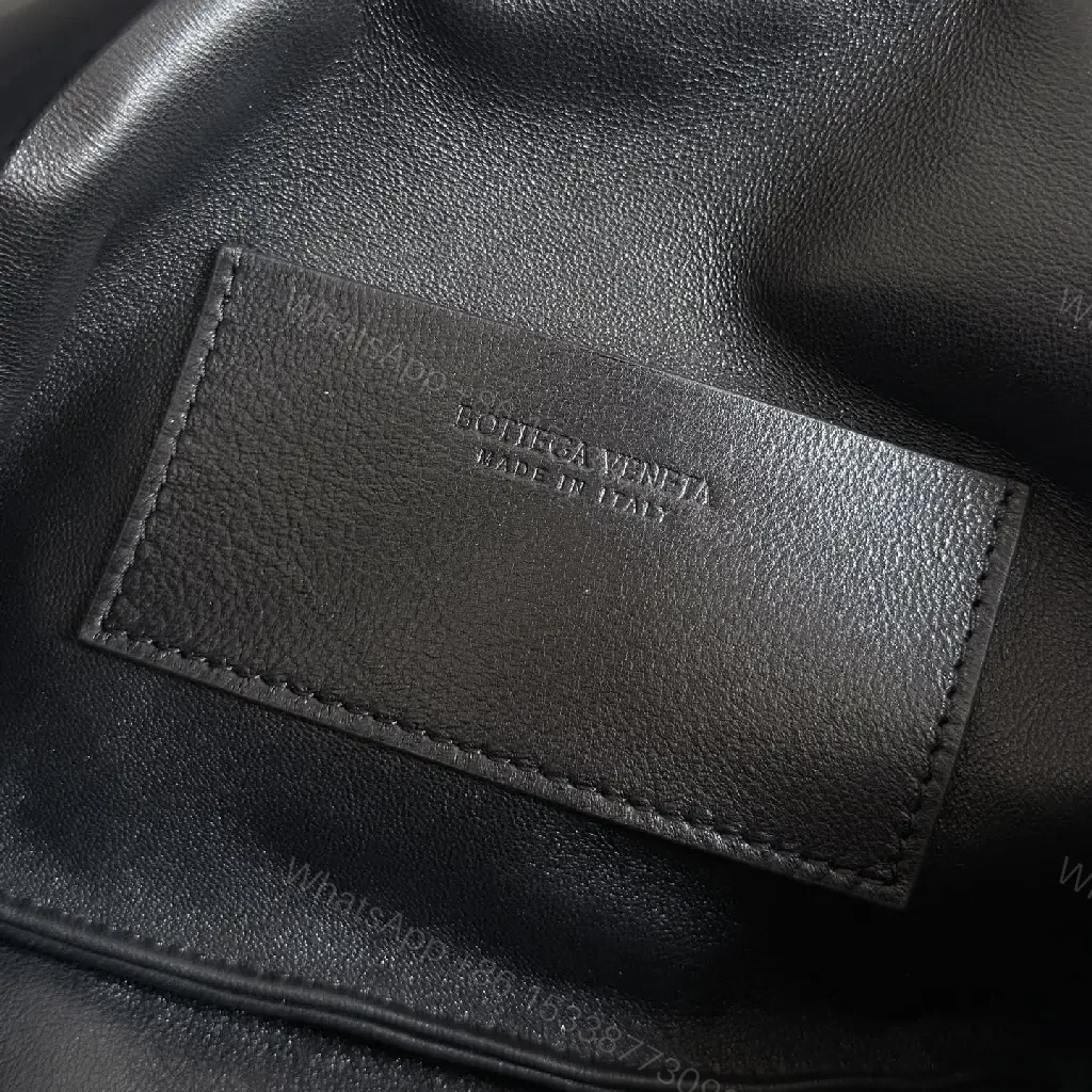 View 7 of Compact braided leather crossbody bag — timeless everyday luxury